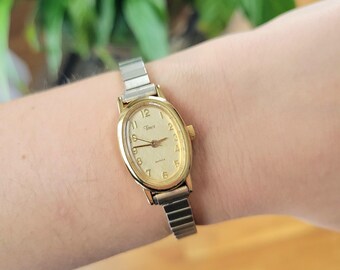 Vintage Timex Classic Womens Womans Gold & Silver Oval Analog Stretch Watch Vintage Timex Classic Womens Womans Gold & Silver Oval  main image 3