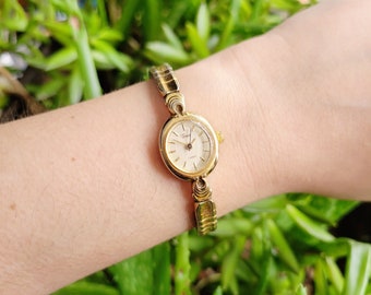 Vintage Timex Dainty Gold Stretch Watch