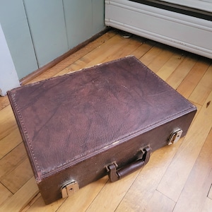 Vintage bruine leren kofferaktetas