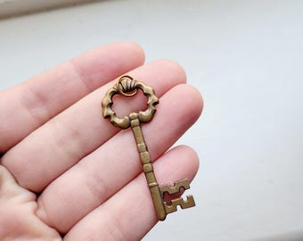 Vintage bronzen sleutelhanger