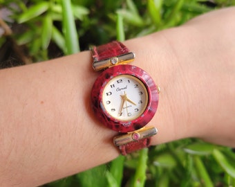 montre vintage à quartz rouge Carvel