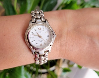 Vintage Avon Leather Roman Numerals Quartz Analog Watch - Etsy display picture 1