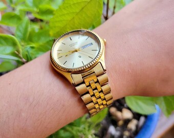 Classic Gold Citizen Quartz Glow in the Dark Calendar Watch  display picture 1