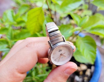 Vintage Timex Indiglo Womens Watch Silver Tone Stretch Band Classic s-l400.jpg main image 4