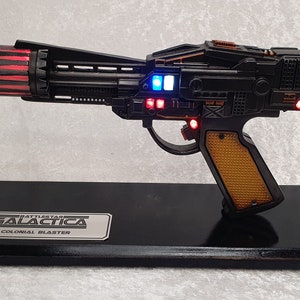 Battlestar Galactica Colonial Blaster and Display