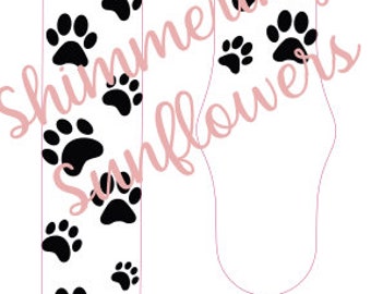 May include: A white Apple Watch band with a black paw print design. The band has a heart with a paw print inside and the text "Jo C" on the other side.