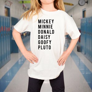 May include: White t-shirt with black text that reads "Mickey Minnie Donald Daisy Goofy Pluto".