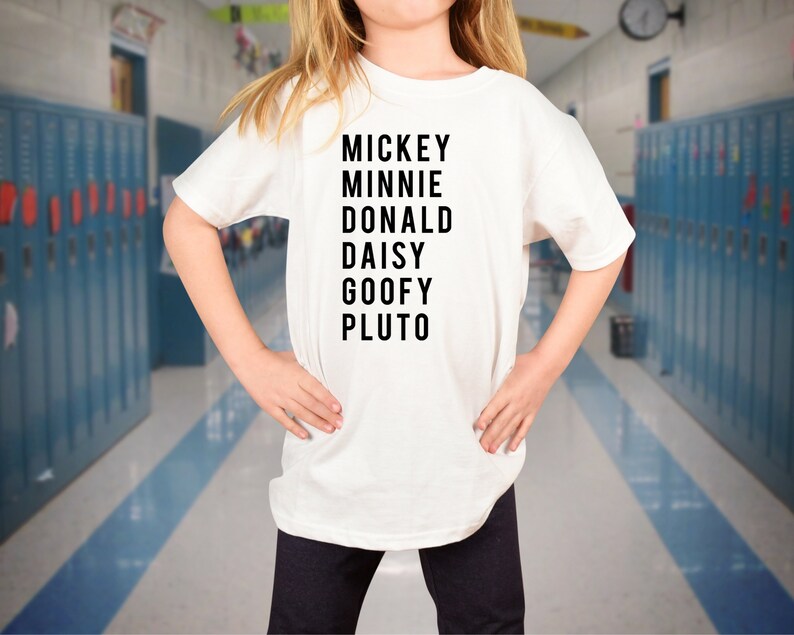 May include: White t-shirt with black text that reads "Mickey Minnie Donald Daisy Goofy Pluto".