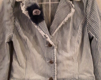 Jeans und Spitzenblazer
