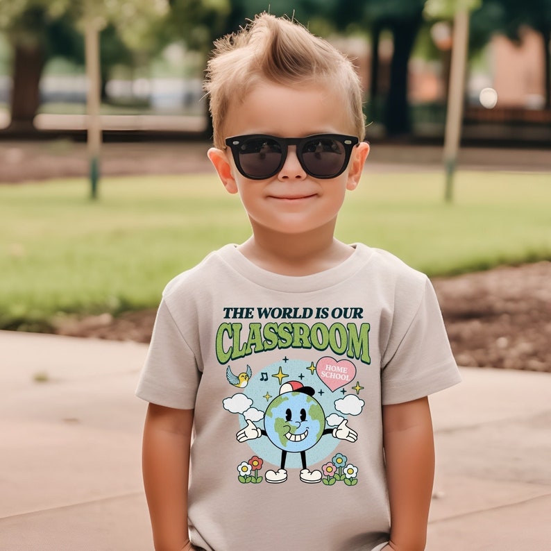 cute animated planet earth on a png file that reads the world is our classroom homeschool mom cute hearts and flowers groovy design