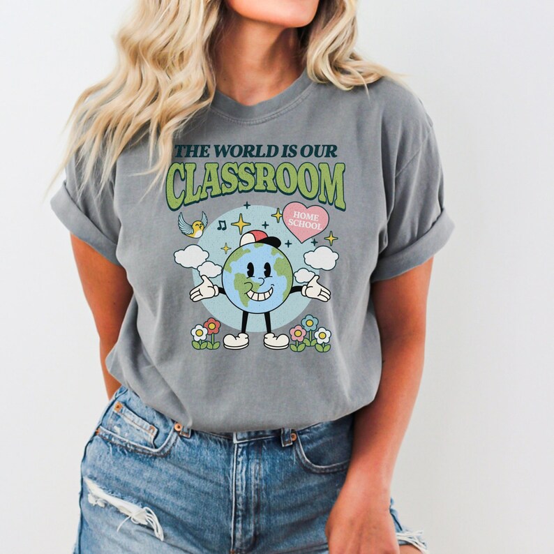 cute animated planet earth on a png file that reads the world is our classroom homeschool mom cute hearts and flowers groovy design