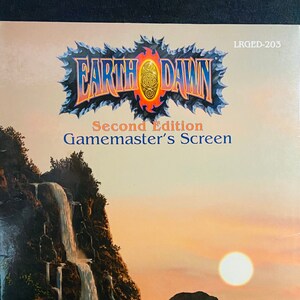 May include: A game master's screen for the Earthdawn role-playing game, second edition. The screen features a scenic image of a waterfall cascading down a mountainside with a sunset in the background. The text "Earthdawn" is in a stylized font with a golden orb in the center. The text "Second Edition" and "Gamemaster's Screen" are below the title.