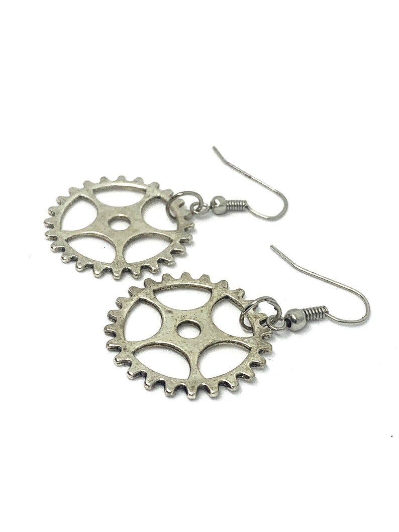 A pair of cog steam punk dangle drop earrings with stainless steel hooks