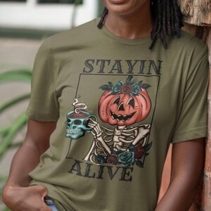 Stayin&#39; Alive Skeleton Pumpkin Head Coffee Lover T-Shirt - Halloween Spooky Season Tee - Funny Coffee Drinkers Shirt - Gift for Coffee Fans