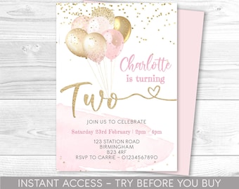 May include: Pink and gold birthday invitation with a watercolor background and balloons. The invitation says "Charlotte is turning Two" and includes the date, time, and location of the party. RSVP information is also included.