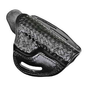 May include: Black leather holster with a woven pattern. The holster has a cut-out for a belt.