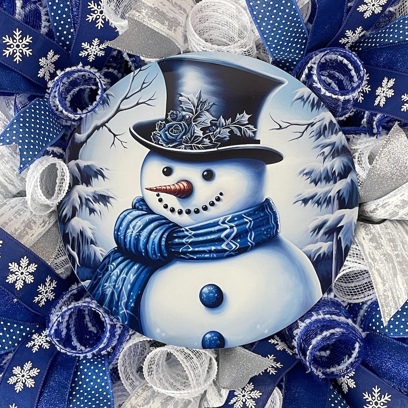 Christmas Porch Decoration Winter Snowman Wreath Holiday Gift Idea Royal Blue Mesh Design Large Front Door Wreath Whimsical Winter Decoration Snowflake Pattern Detail Festive Home Entrance Display Holiday Season Welcome Sign Beautiful