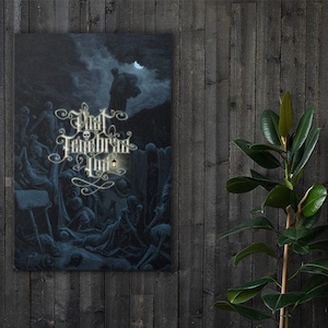 May include: A dark blue canvas print with a black and white illustration of a group of people in a graveyard. The text "That Fellowship" is written in gold script.