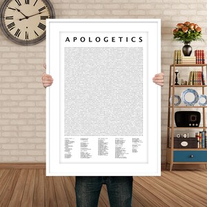 May include: A white framed poster with the word "APOLOGETICS" printed in black at the top. The poster features a large word search puzzle with black text on a white background.