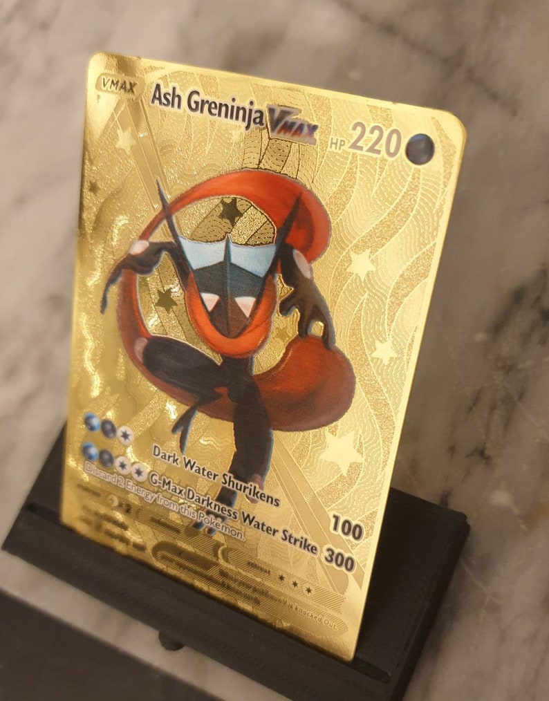 gold metal pokemon card