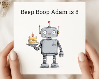 Puede incluir: Tarjeta de cumpleaños con un robot de dibujos animados sosteniendo un pastel con una vela encendida. La tarjeta dice "Beep Boop Adam is 8" en texto negro. El robot es gris con detalles naranjas.