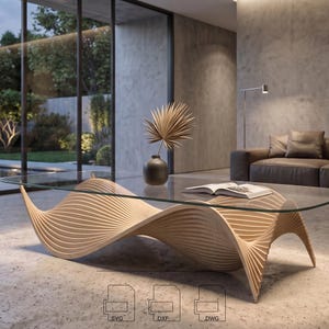 May include: A modern coffee table with a clear glass top and a unique, wave-like wooden base. The base is made of light-colored wood with a ribbed design. A vase with a dried plant and an open book are on the table. The table is in a modern living room.