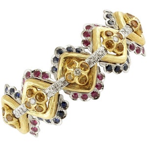 White Diamonds, Blue Sapphires, Rubies White and Yellow Gold Link Bracelet