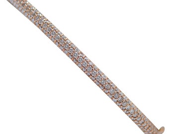 Pulsera moderna de diamantes y oro rosa de 18 quilates.