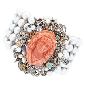 Pearls,Coral,Diamonds,Emeralds,Sapphires,Rubies,Topazs,Gold and Silver Bracelet.