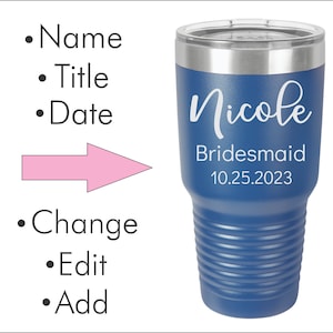 May include: A blue insulated tumbler with a silver rim and lid. The tumbler has the name "Nicole", the title "Bridesmaid", and the date "10.25.2023" printed in white. The tumbler has a ridged design.