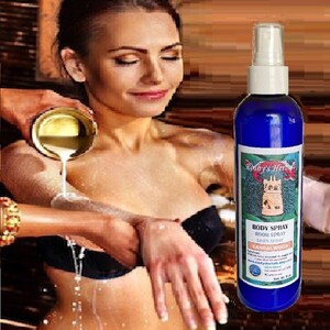 May include: A blue bottle with a white spray top. The bottle has a label that reads 'Roshy's Herbals Body Spray Room Spray Linen Spray Sandalwood 100% Natural  Roshy's Herbals.com  Net Wt. 4 fl oz.'