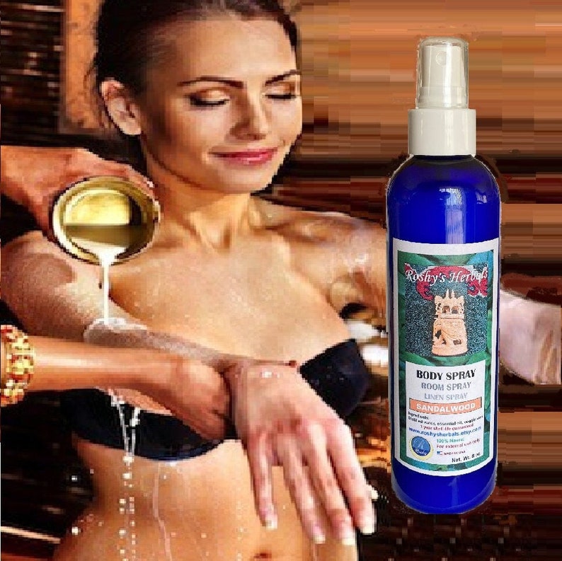 May include: A blue bottle with a white spray top. The bottle has a label that reads 'Roshy's Herbals Body Spray Room Spray Linen Spray Sandalwood 100% Natural  Roshy's Herbals.com  Net Wt. 4 fl oz.'