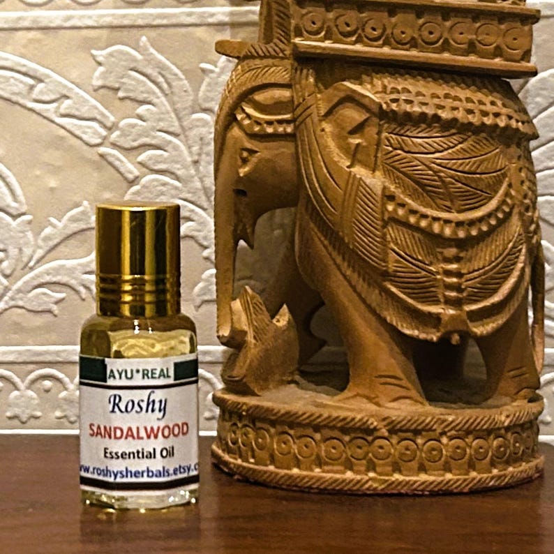 Mysore Sandalwood Essential Oil (H): 5 ml. Natural, high-end aromatherapy oil with earthy sweet woody aroma. Roll-on skin & add to cream. image 1