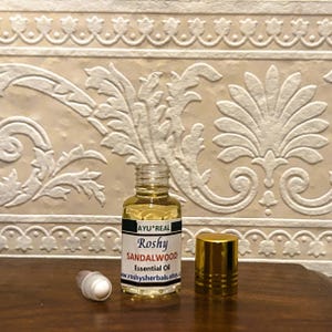Mysore Sandalwood Essential Oil (H): 5 ml. Natural, high-end aromatherapy oil with earthy sweet woody aroma. Roll-on skin & add to cream. image 2