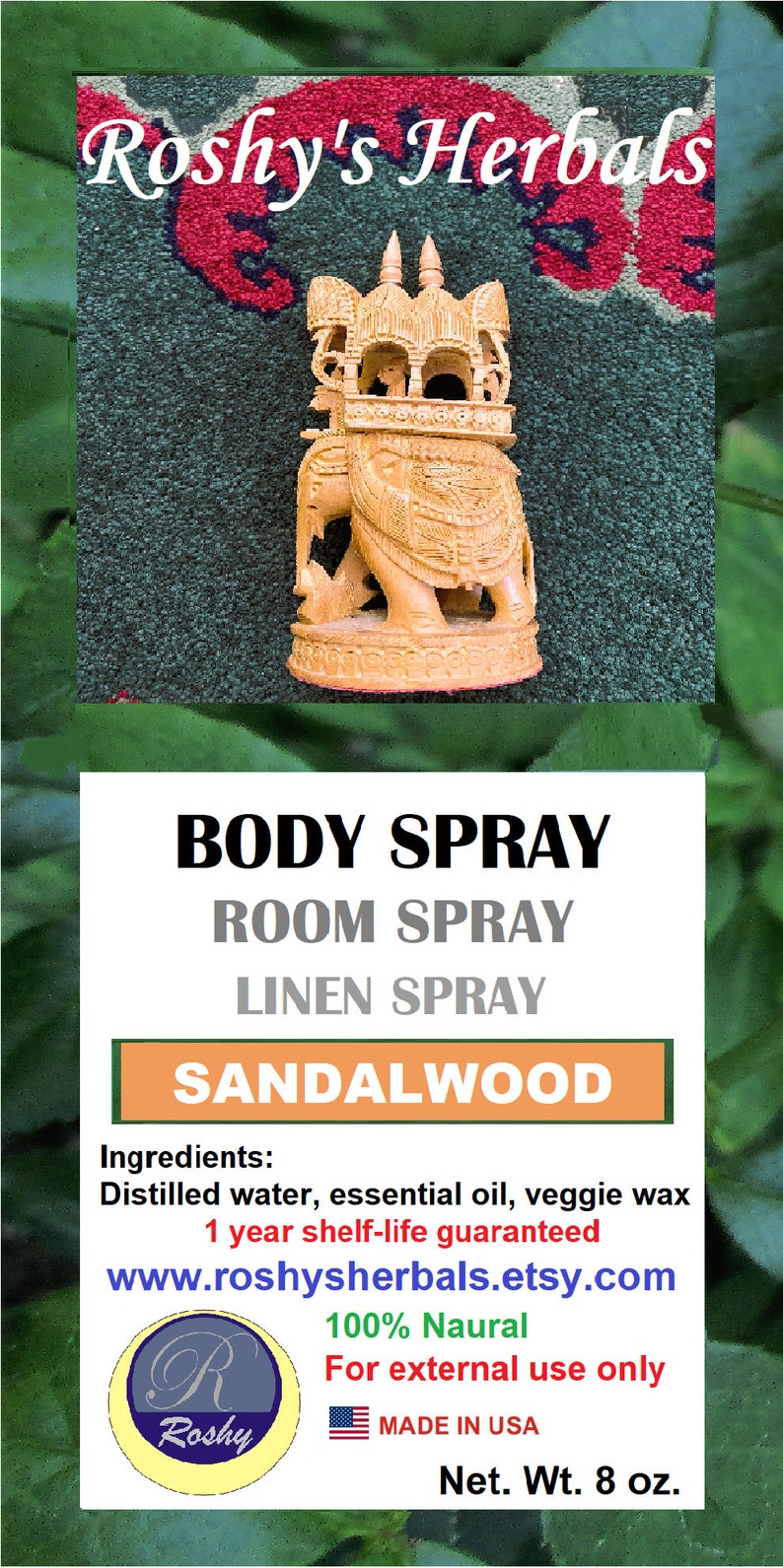 May include: A wooden elephant figurine with a decorative canopy, labeled "Roshy's Herbals". The product is a sandalwood body, room, and linen spray. The label states "100% Natural" and "For external use only". The product is made in the USA and comes in an 8 oz bottle.