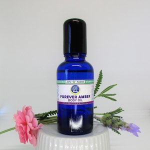 Forever Amber Body Oil,  Roll-on, 1 oz. 100% natural, therapeutic grade essential oil blend, skin moisturizer. Very ladylike !