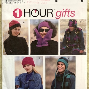 May include: A sewing pattern for making winter accessories. The pattern includes instructions for making a hat, scarf, and mittens. The pattern is from Simplicity and is called "1 Hour Gifts".
