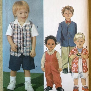 May include: Simplicity sewing pattern 7107 featuring illustrations of children's clothing. The pattern includes a vest, shorts, overalls, a blazer, and a Hawaiian shirt. The pattern size is A ½, 1, 2, 3, 4.