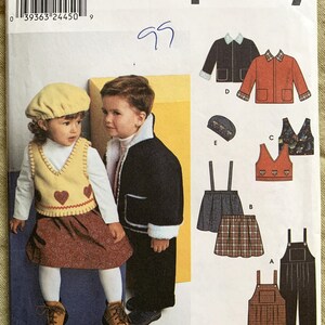 May include: A sewing pattern for children's clothing, including a vest, skirt, overalls, and a jacket. The pattern is from Simplicity and the pattern number is 9456.