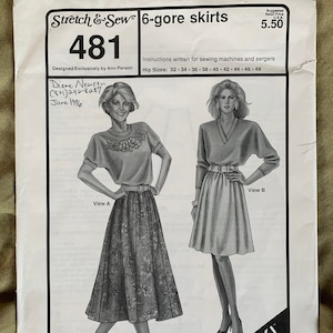 May include: A black and white sewing pattern for a 6-gore skirt. The pattern number is 481. The pattern is designed by Ann Person and is for hip sizes 32-48 inches. The pattern includes instructions for sewing machines and sergers. The pattern is called "Stretch & Sew" and is labeled "Quick! Make it in 4 minutes."