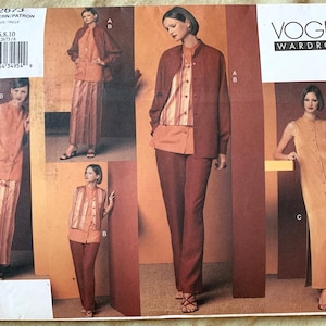 May include: A sewing pattern for a dress and top with a striped design. The pattern is from Vogue Wardrobe and has the number 2673.