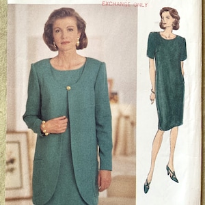 May include: A sewing pattern for a dress and jacket set. The pattern is for sizes 20-22-24. The pattern is from the Vogue Woman collection. The pattern is for a teal green dress and jacket set. The pattern is for a dress with a scoop neck and a jacket with a collar and long sleeves. The pattern is for a dress with a skirt that is slightly flared. The pattern is for a jacket with a front that is open and has a single button closure. The pattern is for a dress and jacket set that is suitable for a formal occasion.