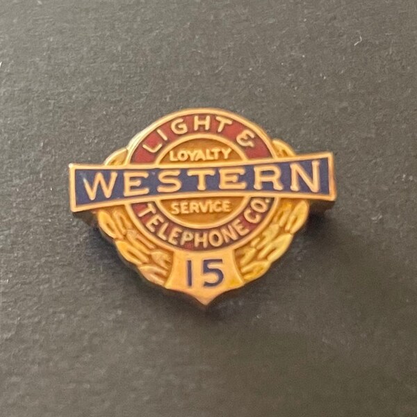 Western light and telephone company pin