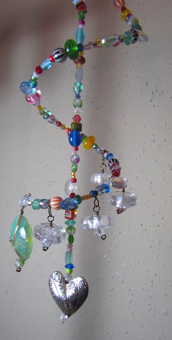 Handmade Spiral Suncatcher with added handmade lampwork beads. Etsy
