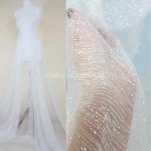 LL-1320 sparkling glitter tulle fabric in white color for lovely bridal and wedding dresses or also veils