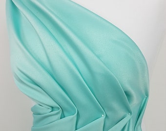 Tessuto satinato italiano in bellissimi colori bianco, avorio