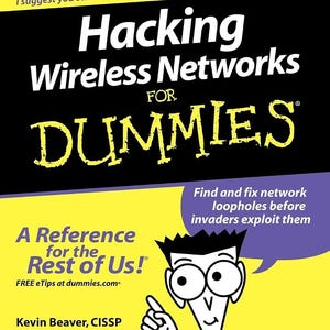 May include: A paperback book titled Hacking Wireless Networks For Dummies with a black and yellow cover. The cover features a cartoon character, the text A Reference for the Rest of Us, and the authors Kevin Beaver and Peter T. Davis.