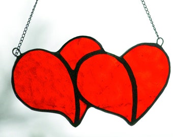 Rose red stained glass love heart suncatcher. Hearts joined together forever an everlasting valentines day, anniversary or birthday present