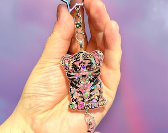 Llavero colgante con cola de tigre con purpurina kawaii pastel inspirado en Lisa Frank