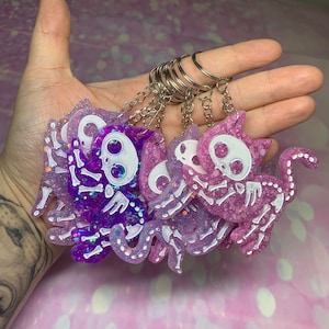 Skelett-Katze-lila Harz Keychain